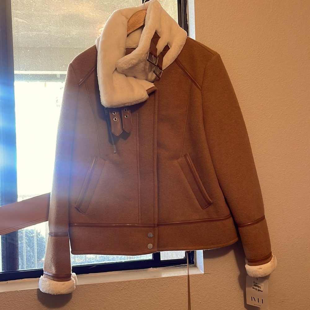 NVLT Coat never worn with tags still on it as well with extra buttons